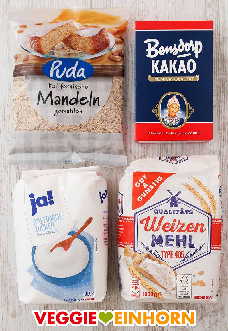 Gemahlene Mandeln von Puda (Penny), Bensdorp Kakao, Rewe ja! Raffinade-Zucker, Edeka Gut und Günstig Weizenmehl Type 405 Gemahlene Mandeln, Kakaopulver, Zucker, Mehl