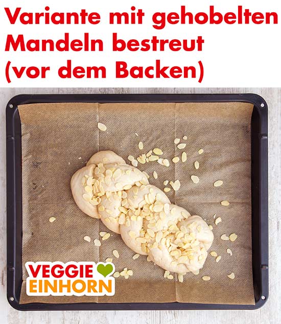 Hefezopf auf dem Backblech mit Pflanzenmilch und Mandelblättchen