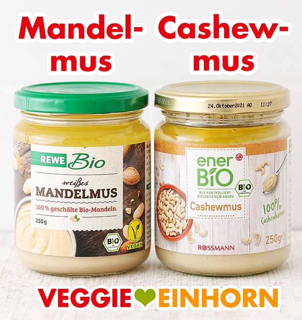 Ein Glas weißes Mandelmus und ein Glas Cashewmus