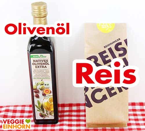 Olivenöl und eine Packung Paella Reis