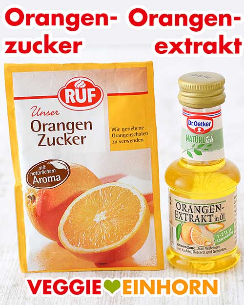 Orangenzucker und Orangenextrakt Ein Päckchen Orangenzucker und ein Fläschchen Orangenextrakt