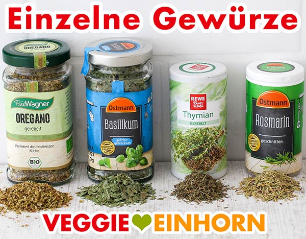 Gewürzgläser mit Oregano, Basilikum, Thymian und Rosmarin