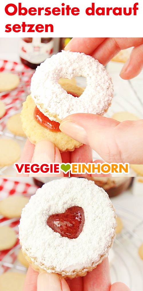 Spitzbuben Plätzchen mit Marmelade - Oberseite darauf setzen Spitzbuben Plätzchen mit Marmelade - Oberseite darauf setzen