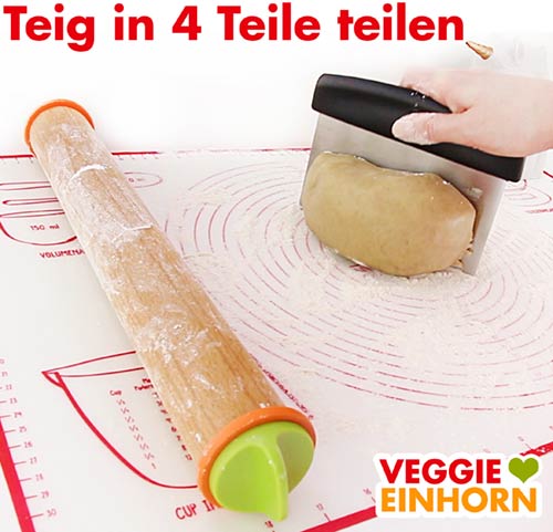 Plätzchenteig in vier Teile teilen Plätzchenteig in vier Teile teilen
