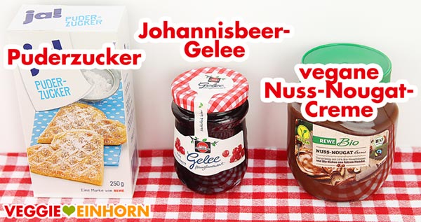 Puderzucker, Johannisbeergelee und vegane Nuss-Nougat-Creme Puderzucker, Johannisbeergelee und vegane Nuss-Nougat-Creme