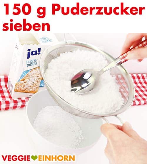 Puderzucker sieben für den Zitronenguss Puderzucker sieben