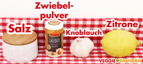 Ein Salztopf, Zwiebeln granuliert von Ostmann, eine Knolle Knoblauch und eine Zitrone Salz, Zwiebelpulver, Knoblauch und Zitrone
