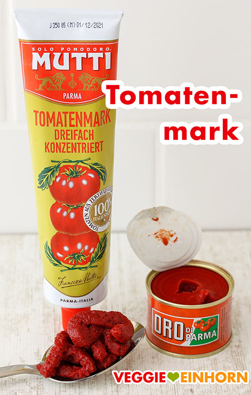 Eine Tube und eine kleine Dose mit Tomatenmark