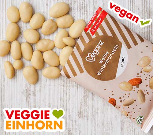 Weiße Wintermandeln von Veganz Geöffnete Packung mit weißen Wintermandeln von Veganz