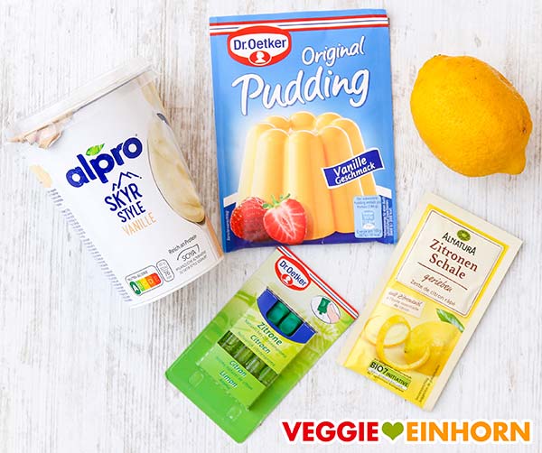 Veganer Vanille Skyr, Dr. Oetker Vanille Puddingpulver, eine Zitrone, Dr. Oetker Zitronenaroma, Alnatura Zitronenschale gerieben Alpro Skyr Style Vanille, Vanillepuddingpulver, Zitrone
