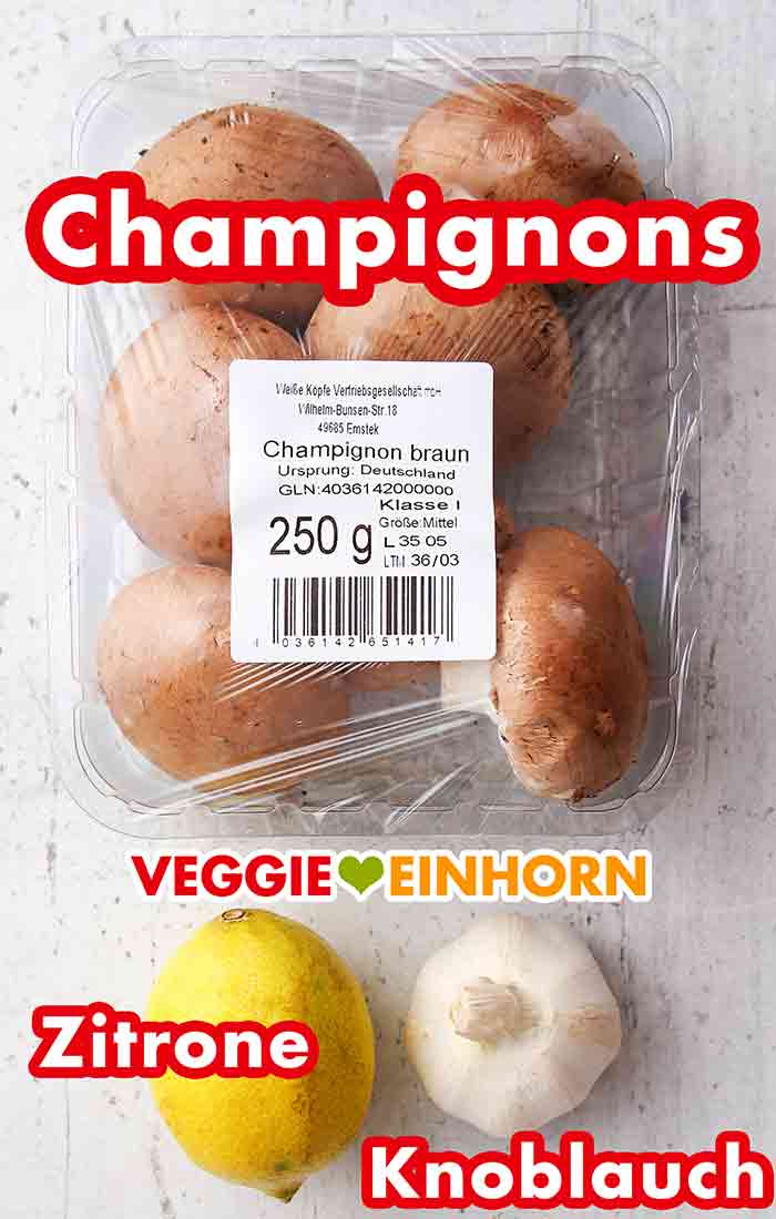 Pilze, Zitrone für Zitronensaft, Knoblauch Frische Champignons, Zitrone, eine Knolle Knoblauch