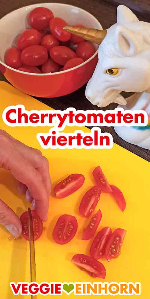 Die Kirschtomaten der Länge nach in Viertel schneiden. Cherrytomaten vierteln
