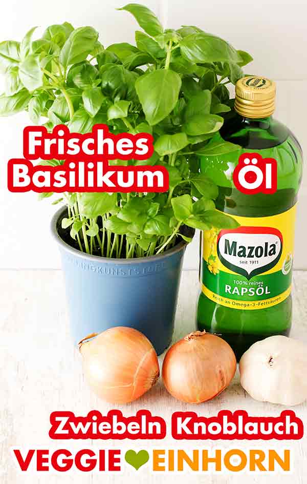 Frisches Basilikum, Mazola Rapsöl, Zwiebeln und Knoblauch Ein Topf Basilikum, eine Flasche Öl, Zwiebeln, Knoblauch