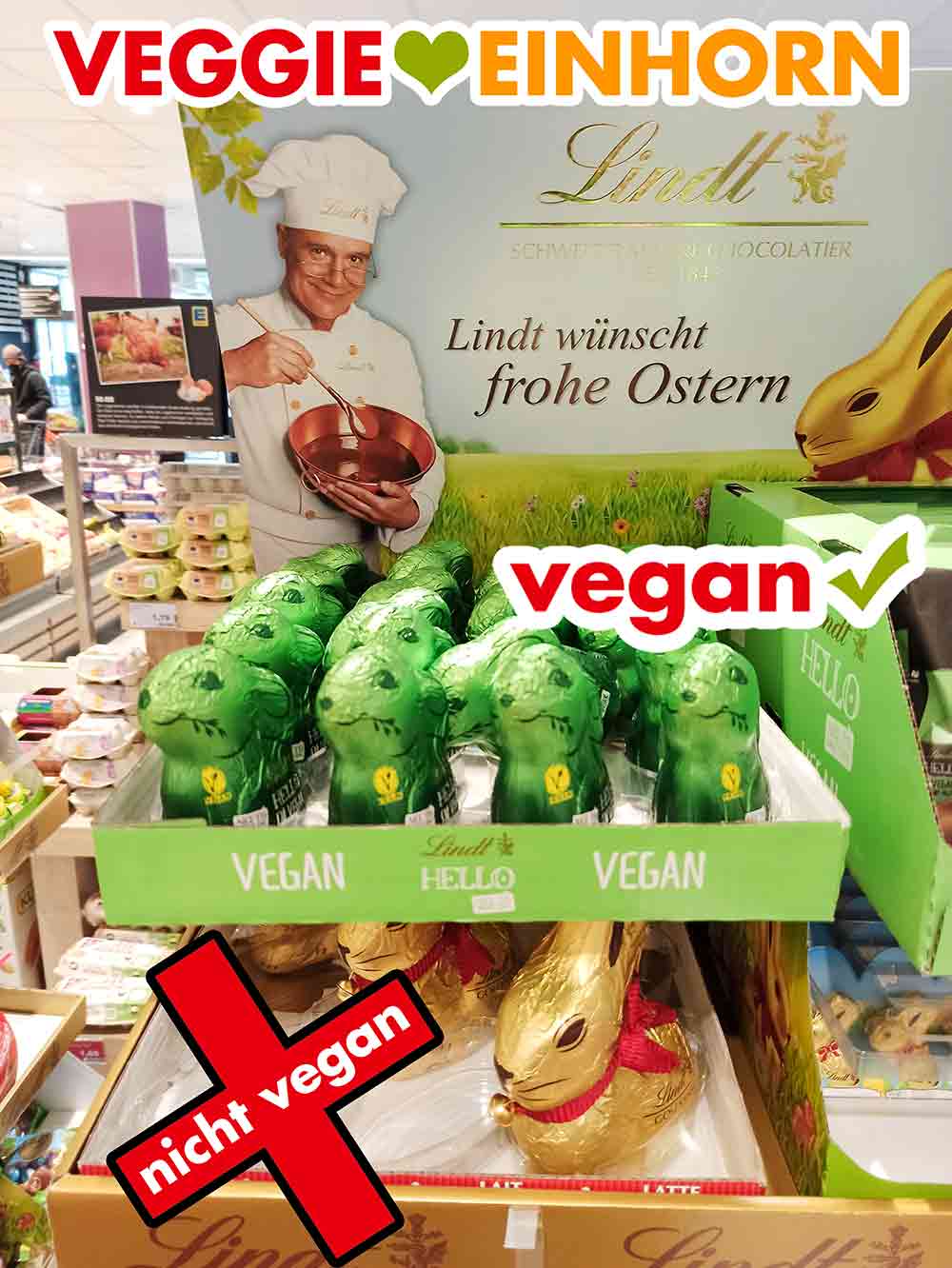 Die Lindt Hello Hasen sind vegan. Die Lindt Goldhasen mit der roten Schleife sind nicht vegan. Aufsteller mit Lindt Schokohasen im Supermarkt