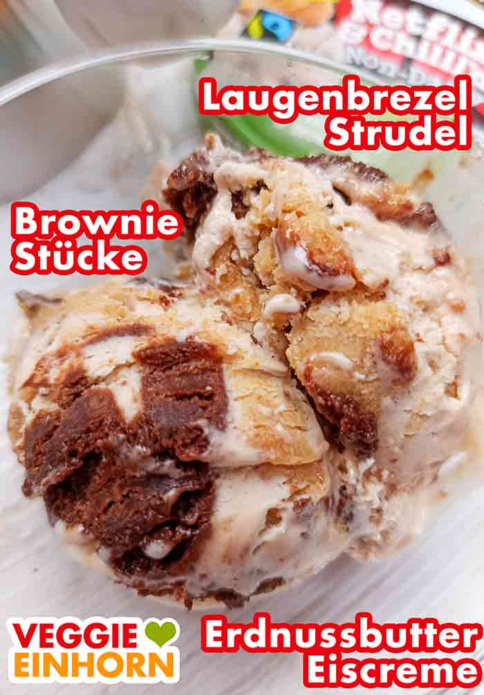 Das Ben & Jerry's Netflix & Chill'd enthält Erdnuss Eiscreme, salzige Brezeln und Brownies. Das vegane Netflix and Chill'd Eis mit Laugenbrezel Strudeln, Brownie Stücken und Erdnussbutter Eis