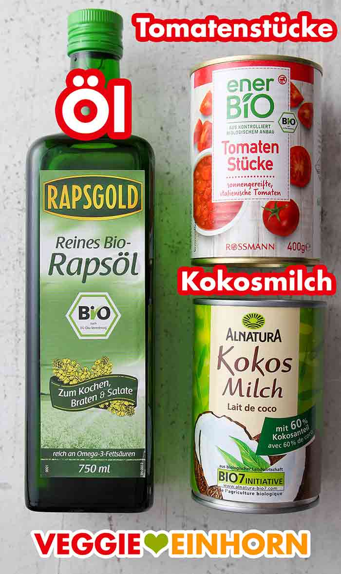 Rapsgold Bio Rapsöl, enerBIO Tomaten aus der Dose, Alnatura Kokosmilch Eine Flasche Bio Rapsöl, eine Dose Tomatenstücke und eine Dose Kokosmilch