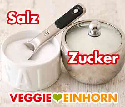 Salz und Zucker Ein Salztopf und eine Zuckerdose