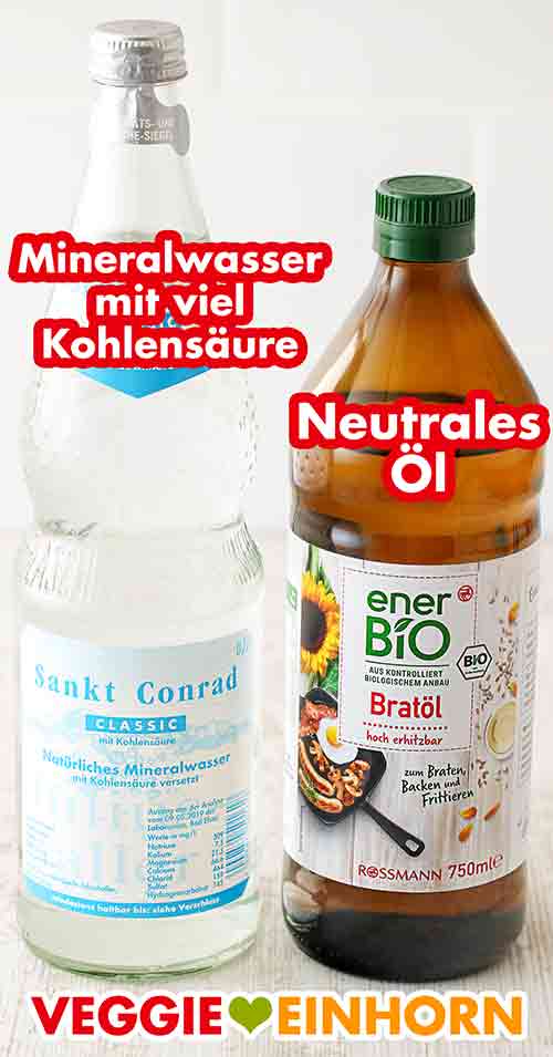 Sprudelwasser mit viel Kohlensäure und Bratöl von enerBIO Eine Flasche Mineralwasser und eine Flasche hoch erhitzbares Bratöl