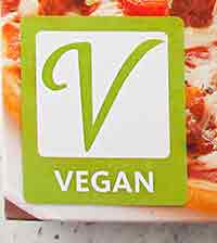 Das Vegan Zeichen auf der veganen Pizza Ristorante Vegan Zeichen auf der Pizza von Dr. Oetker