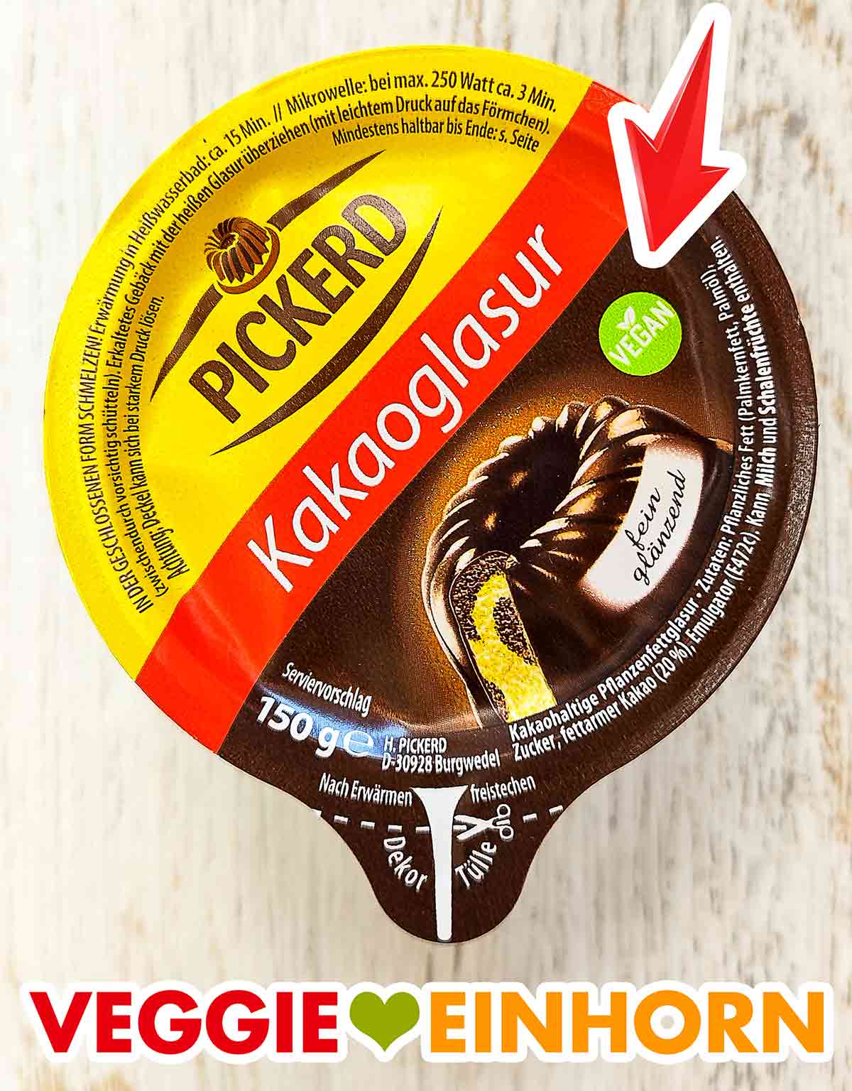 Auf der Pickerd Kakaoglasur ist ein Vegan Zeichen Vegan Zeichen auf der Packung der Pickerd Kakaoglasur