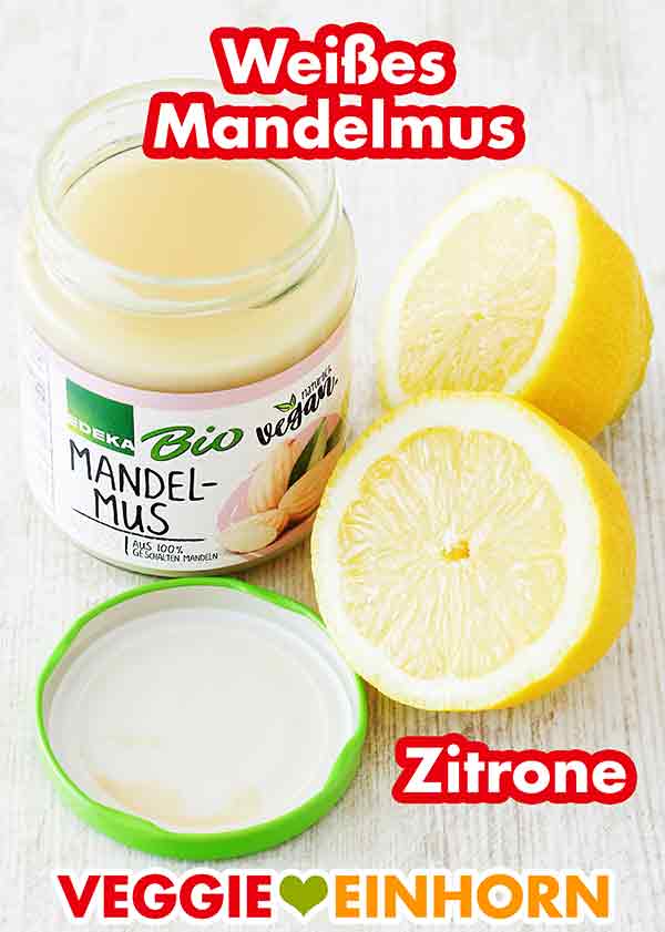 Weißes Mandelmus von Edeka Bio und eine Zitrone Ein Glas Mandelmus und eine Zitrone