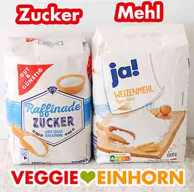 Zucker von Gut und Günstig und Weizenmehl Type 405 von Rewe ja! Eine Packung Zucker und eine Packung Mehl